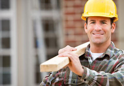man carrying board